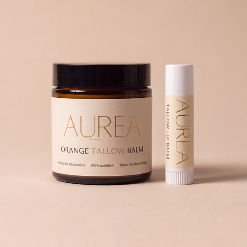 Aurea Duo mit Orange Tallow Balm 120 ml und Tallow Lip Balm nebeneinander